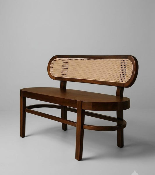 Sheesham and natural cane dining bench by Sellixpk Furniture Hub featuring a wooden frame and woven cane seat.