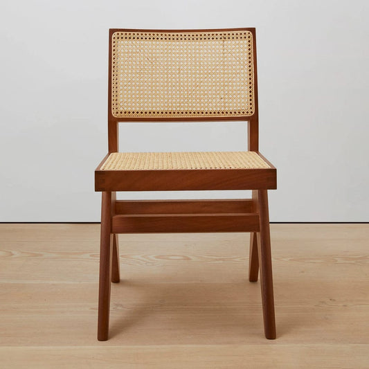 Premium solid wood and natural rattan dining chair by Sellix, handcrafted modern accent chair with stylish woven rattan details.